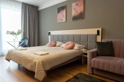 Łóżko lub łóżka w pokoju w obiekcie Apartments 