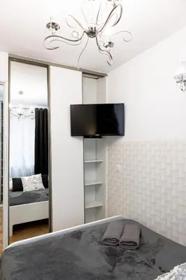 Telewizja i/lub zestaw kina domowego w obiekcie ClickTheFlat Old Town Apart Rooms