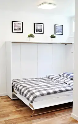 Łóżko lub łóżka w pokoju w obiekcie Warsaw Concierge Rondo ONZ