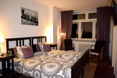 Łóżko lub łóżka w pokoju w obiekcie Fiesta Apartament