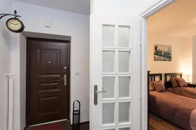 Łóżko lub łóżka w pokoju w obiekcie Fiesta Apartament