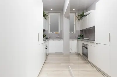 Kuchnia lub aneks kuchenny w obiekcie City Center Apartments Hoża by Noclegi Renters