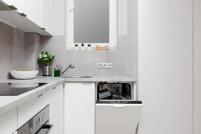 Kuchnia lub aneks kuchenny w obiekcie City Center Apartments Hoża by Noclegi Renters