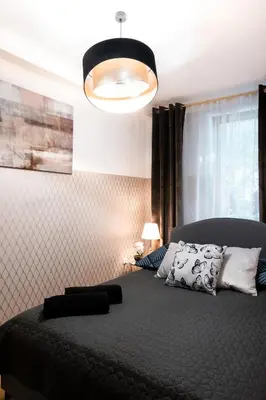 Łóżko lub łóżka w pokoju w obiekcie ClickTheFlat Constitution Square Apart Rooms