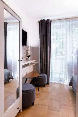 Łóżko lub łóżka w pokoju w obiekcie ClickTheFlat Constitution Square Apart Rooms