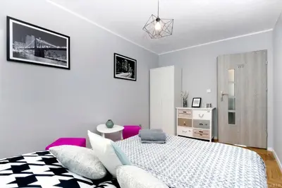 Łóżko lub łóżka w pokoju w obiekcie ClickTheFlat Hoża Street Apart Rooms