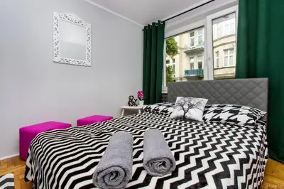 Łóżko lub łóżka w pokoju w obiekcie ClickTheFlat Hoża Street Apart Rooms