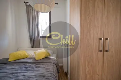 Łóżko lub łóżka w pokoju w obiekcie Chill Apartments City Link