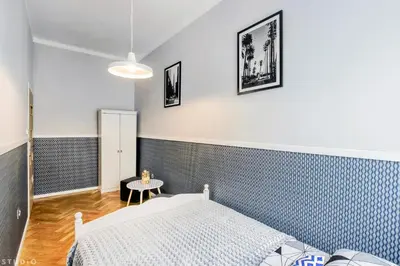 Łóżko lub łóżka w pokoju w obiekcie ClickTheFlat Wspólna Central Apart Rooms