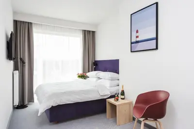Łóżko lub łóżka w pokoju w obiekcie Platinum Hotel&Residence Wilanów