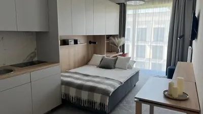 Łóżko lub łóżka w pokoju w obiekcie Platinum Hotel&Residence Wilanów