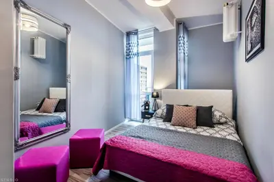Łóżko lub łóżka w pokoju w obiekcie ClickTheFlat Tamka Street Apart Rooms