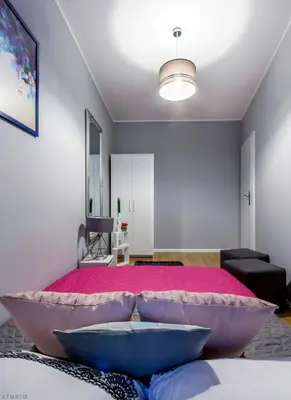Łóżko lub łóżka w pokoju w obiekcie ClickTheFlat Tamka Street Apart Rooms