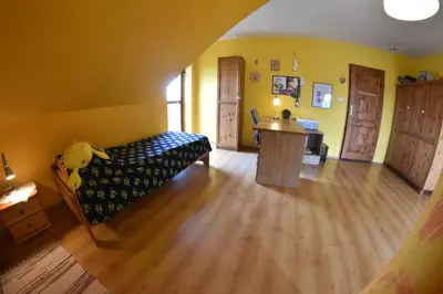 Część wypoczynkowa w obiekcie Comfortable house with garden