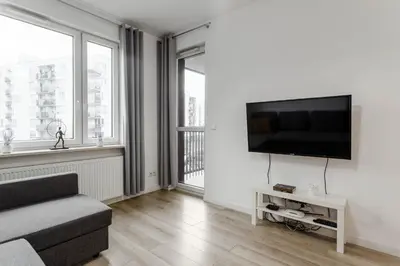 Telewizja i/lub zestaw kina domowego w obiekcie Chill Apartments Airport Apartments