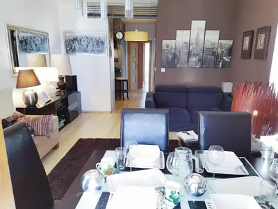 Część wypoczynkowa w obiekcie Warsaw King Size Apartment