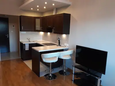 Kuchnia lub aneks kuchenny w obiekcie MG Apartments Giełdowa