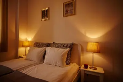 Łóżko lub łóżka w pokoju w obiekcie Marszałkowska Apartament