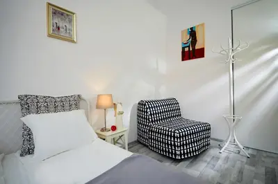 Łóżko lub łóżka w pokoju w obiekcie Marszałkowska Apartament