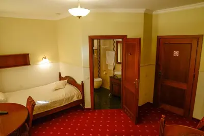 Łóżko lub łóżka w pokoju w obiekcie Nature Clinic Park Hotel