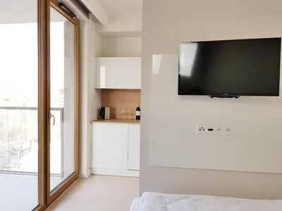 Telewizja i/lub zestaw kina domowego w obiekcie Chopin Apartments - Union