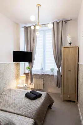 Łóżko lub łóżka w pokoju w obiekcie ClickTheFlat Aleje Jerozolimskie Center Apart Rooms