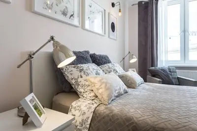 Łóżko lub łóżka w pokoju w obiekcie Apartament MODERN SCANDI Waszyngtona