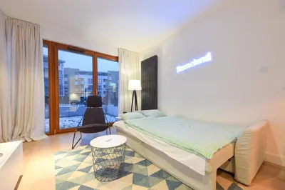 Łóżko lub łóżka w pokoju w obiekcie ShortStayPoland Kieslowskiego (B41)