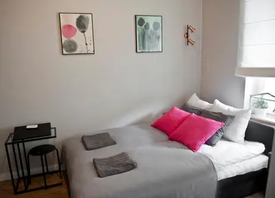 Łóżko lub łóżka w pokoju w obiekcie Apartament Piano