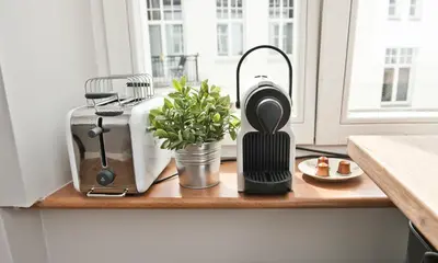 Zestaw do parzenia kawy i herbaty w obiekcie Apartament Piano