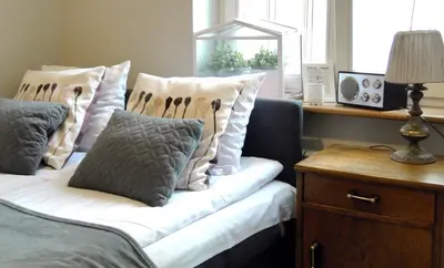 Łóżko lub łóżka w pokoju w obiekcie Apartament Piano
