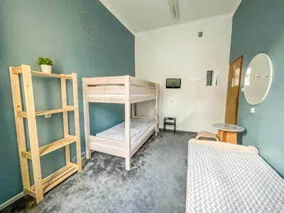 Łóżko lub łóżka w pokoju w obiekcie Moon Hostel Warszawa