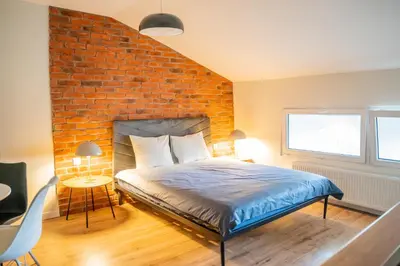 Łóżko lub łóżka w pokoju w obiekcie Moon Hostel Warszawa