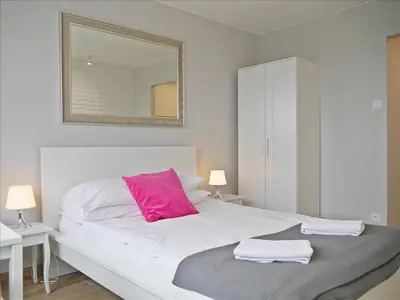 Łóżko lub łóżka w pokoju w obiekcie Bagno 154 City centre