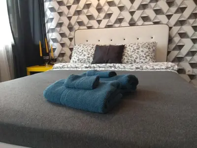 Łóżko lub łóżka w pokoju w obiekcie Apartament Pańska
