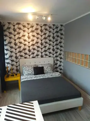 Łóżko lub łóżka w pokoju w obiekcie Apartament Pańska