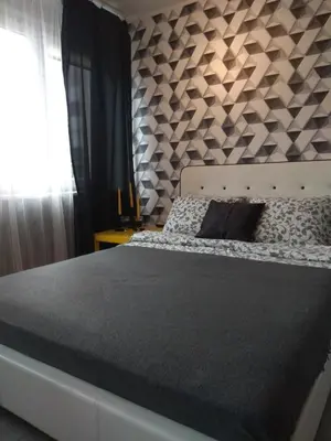 Łóżko lub łóżka w pokoju w obiekcie Apartament Pańska