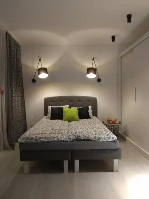 Łóżko lub łóżka w pokoju w obiekcie Apartament Nikola
