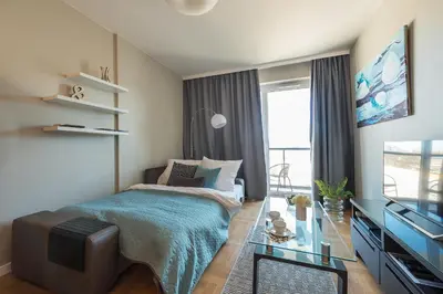 Telewizja i/lub zestaw kina domowego w obiekcie P&O Apartments KONSTRUKTORSKA Mokotów