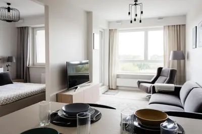 Telewizja i/lub zestaw kina domowego w obiekcie LuxLux Apartments Metro Slodowiec