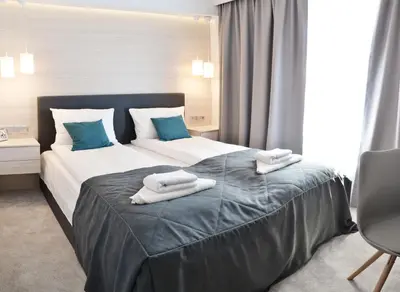 Łóżko lub łóżka w pokoju w obiekcie Smart2Stay Apartamenty