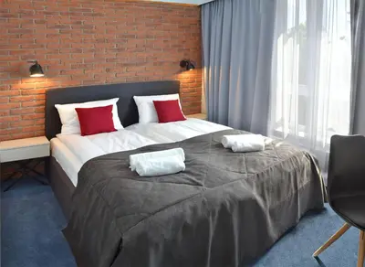 Łóżko lub łóżka w pokoju w obiekcie Smart2Stay Apartamenty