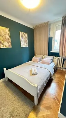 Łóżko lub łóżka w pokoju w obiekcie Beloved Warsaw Apartments- Aleja Jana Pawła II