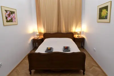 Łóżko lub łóżka w pokoju w obiekcie APARTAMENT na DLUGIEJ