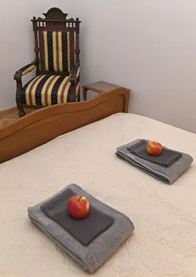 Łóżko lub łóżka w pokoju w obiekcie APARTAMENT na DLUGIEJ