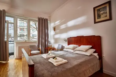 Łóżko lub łóżka w pokoju w obiekcie Trakt Królewski Place for You