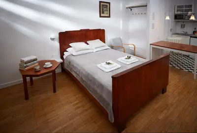 Łóżko lub łóżka w pokoju w obiekcie Trakt Królewski Place for You