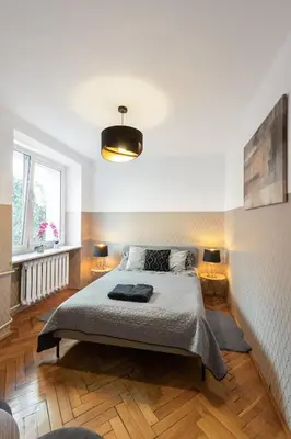 Łóżko lub łóżka w pokoju w obiekcie ClickTheFlat Żurawia Street Apart Rooms