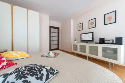 Łóżko lub łóżka w pokoju w obiekcie P&O Serviced apartments CH ARKADIA 2