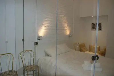 Łóżko lub łóżka w pokoju w obiekcie Lovely apartment- Poznanska 16